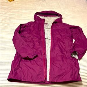 Women’s large Mountain Hardwear long rain jacket